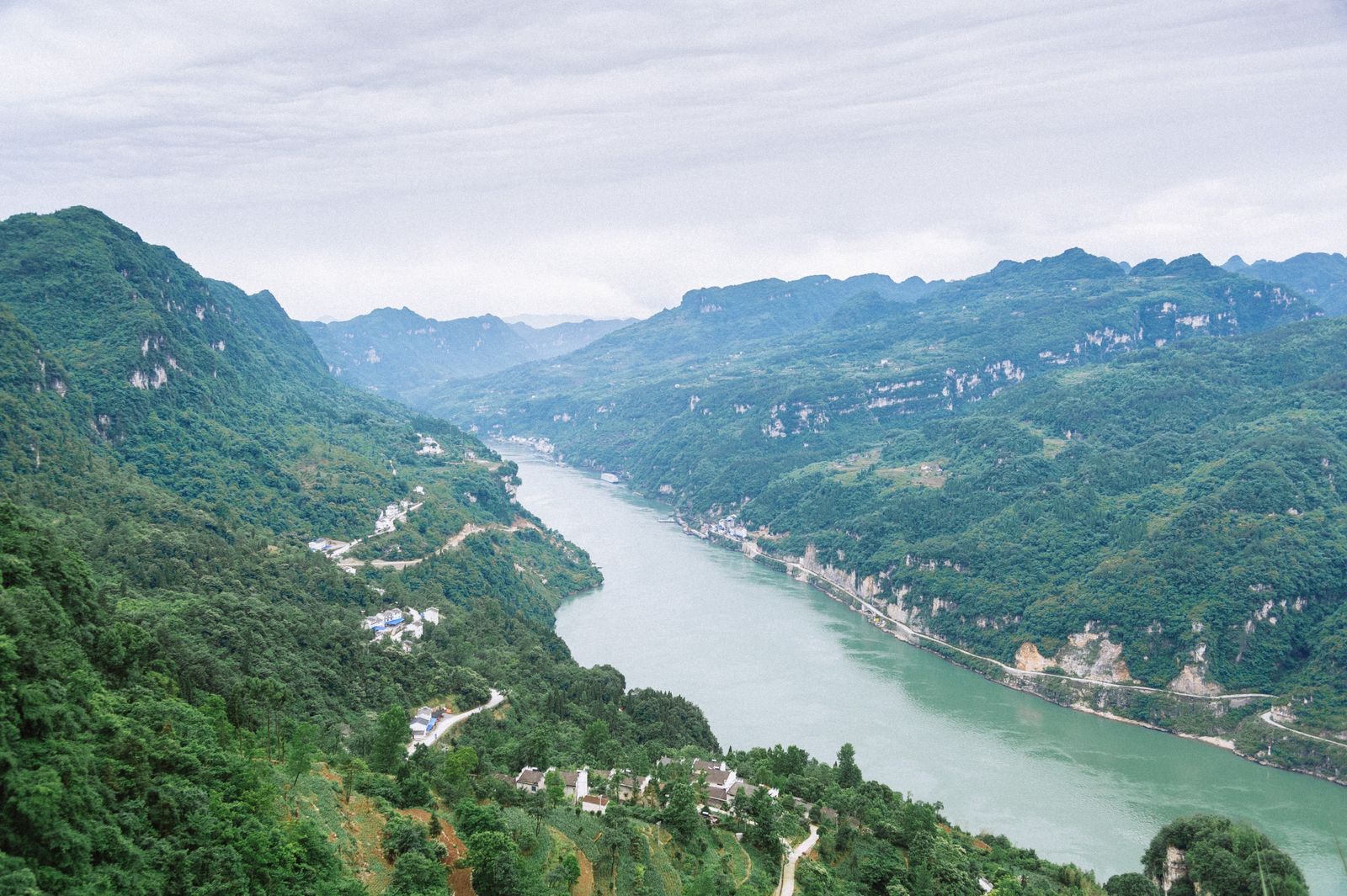 Aerial view of the Yangtze River winding through green mountains near Yichang, China